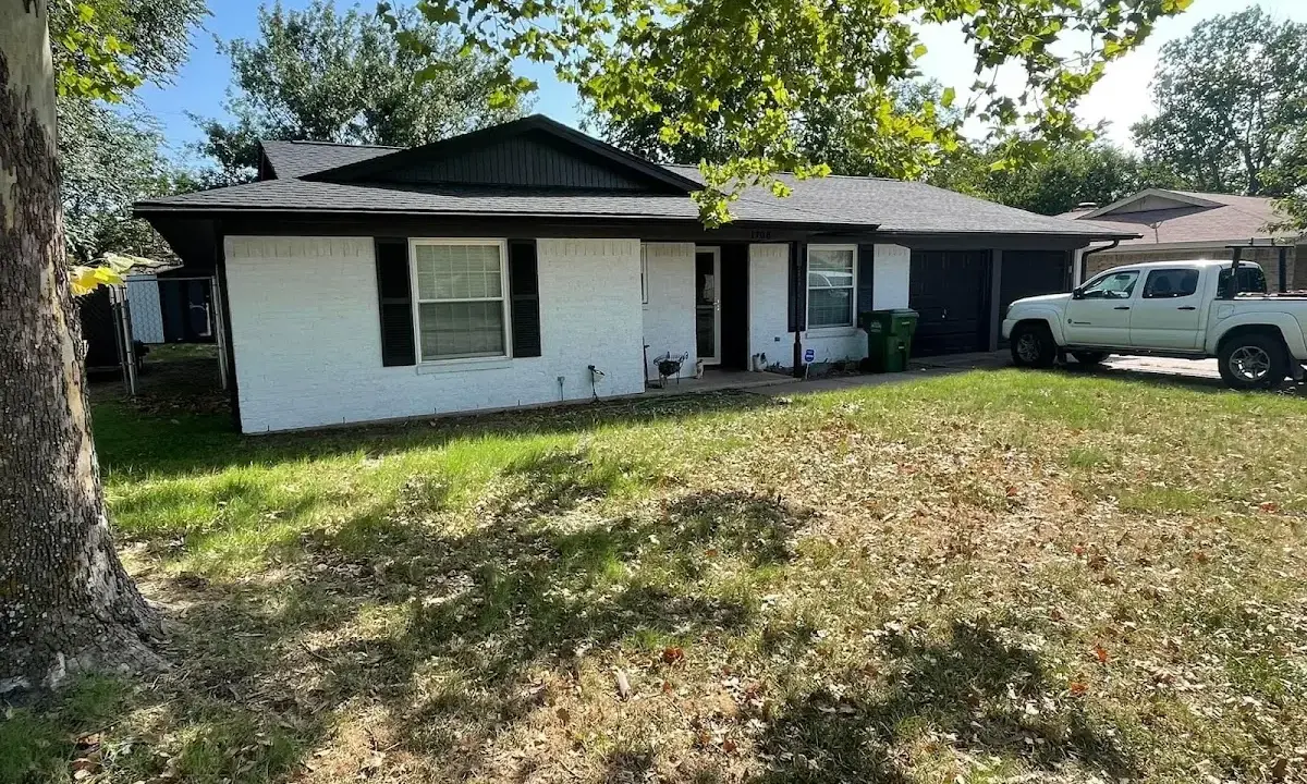 Professional roofing crew working on a residential roof in Horseheads
